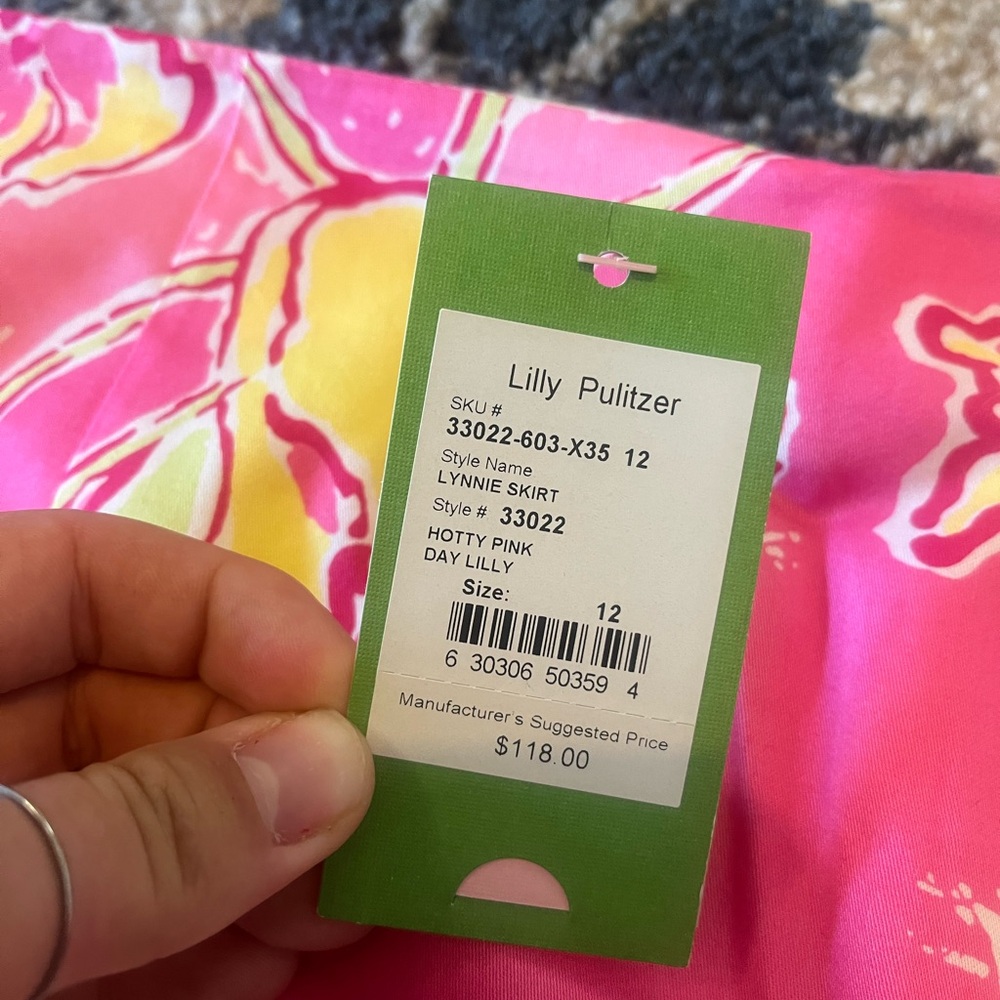 Lilly Pulitzer Lynnie Skirt in the "Hotty Pink Day Lilly" print. - Picture 2 of 4